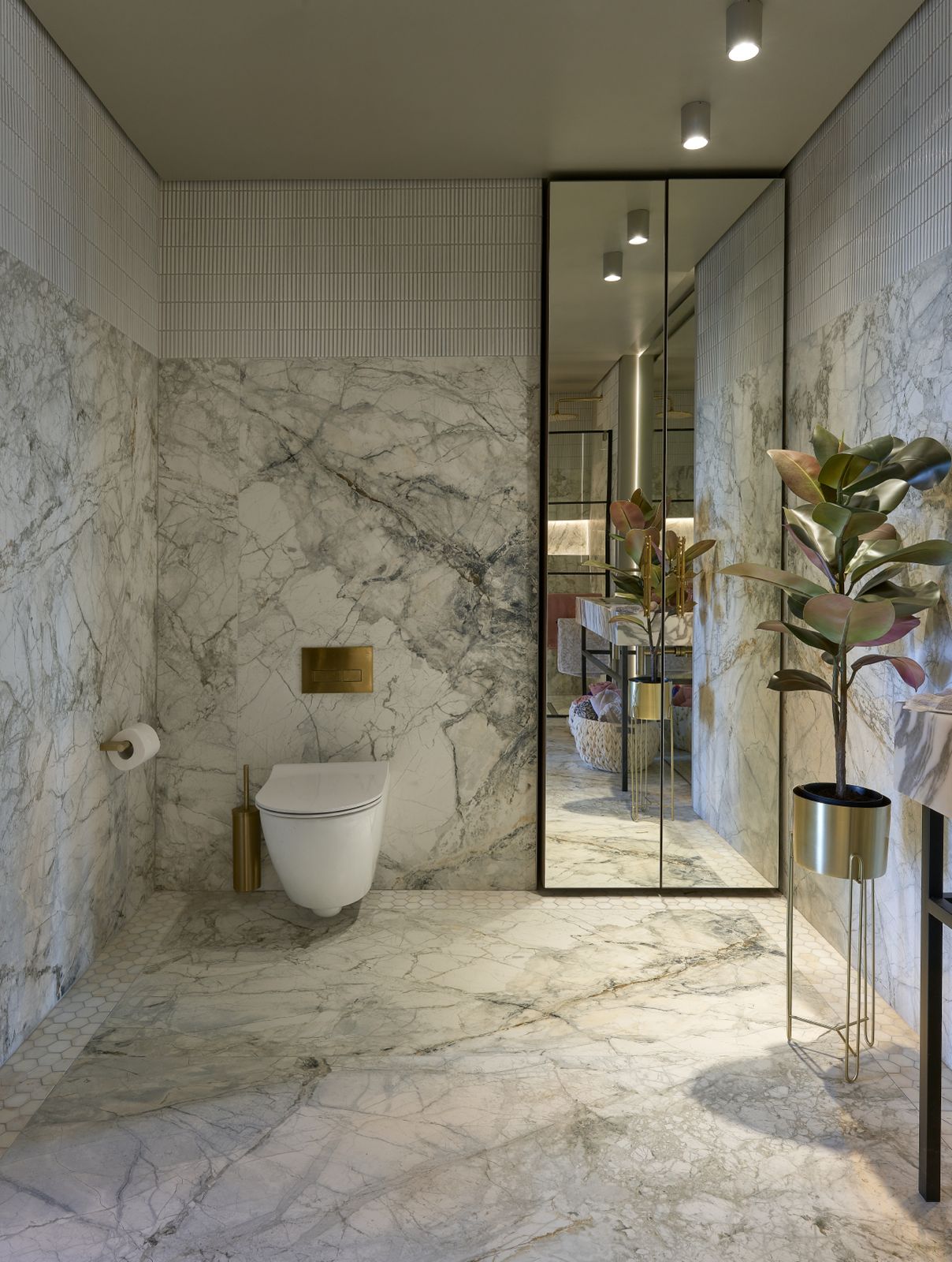 The House on the Park — en suite with book-matched marble, brass and mirrored cabinet
